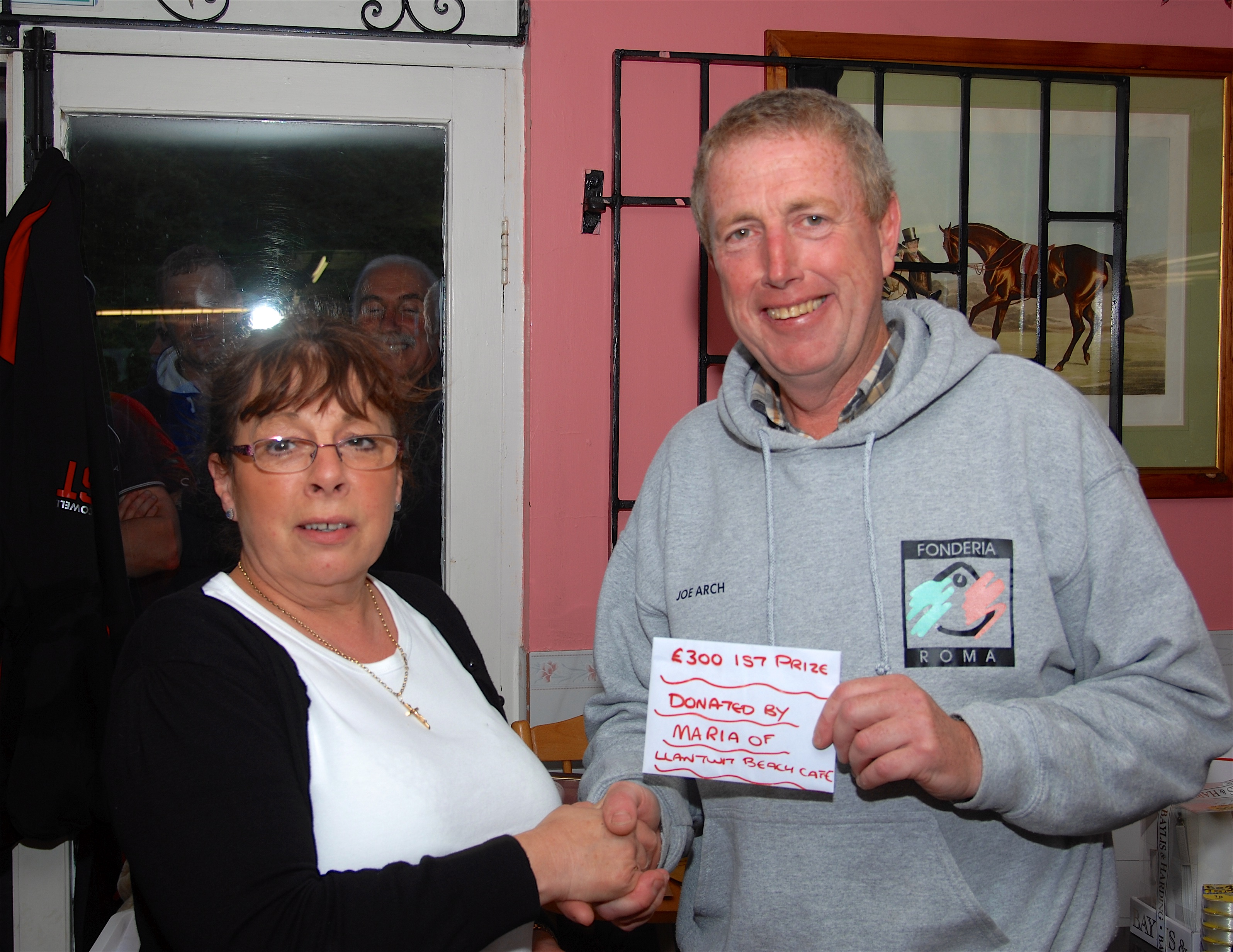 Llanwit Major Beach Cafe owner Maria Hughes and senior winner Joe Arch.